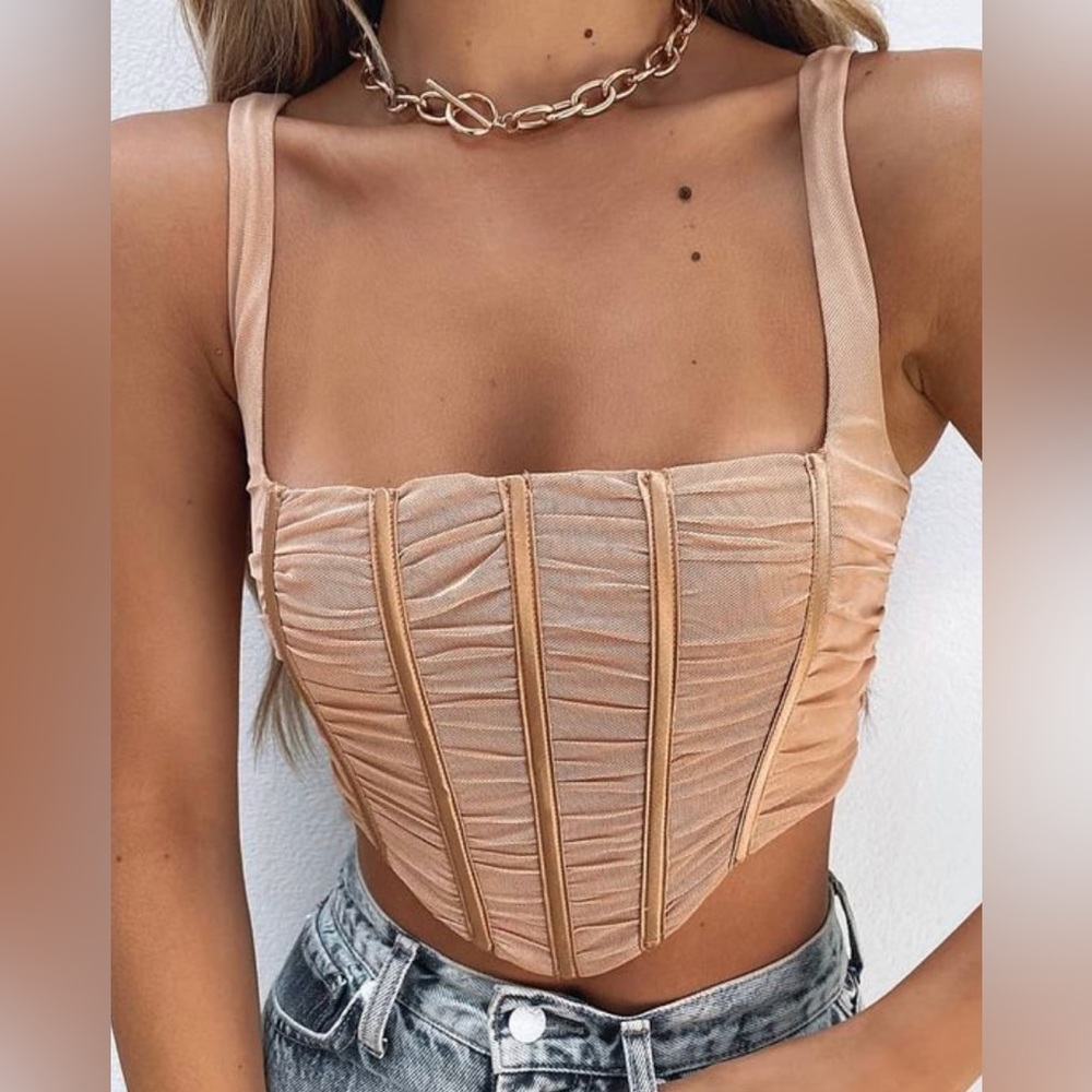 Like pink , white fox, small , corset , first row broken easy fix